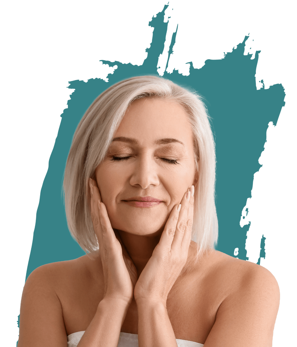 Middle aged woman touching her face